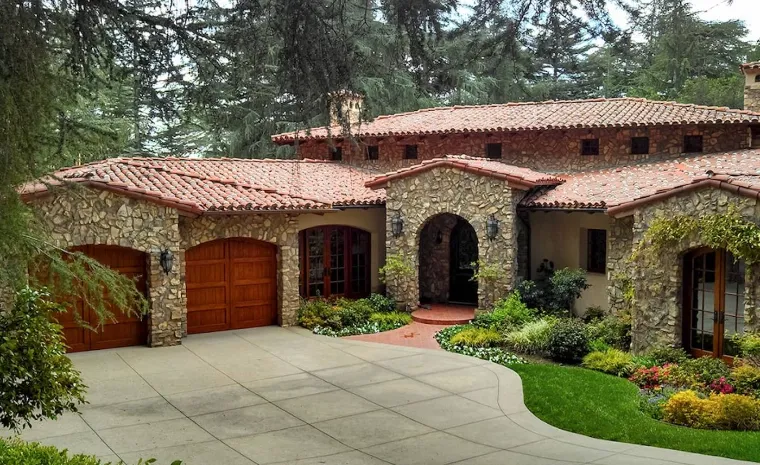 Completed clay tile roof on a stone estate